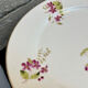 8 assiettes en porcelaine fleurie, fin XIXeme
