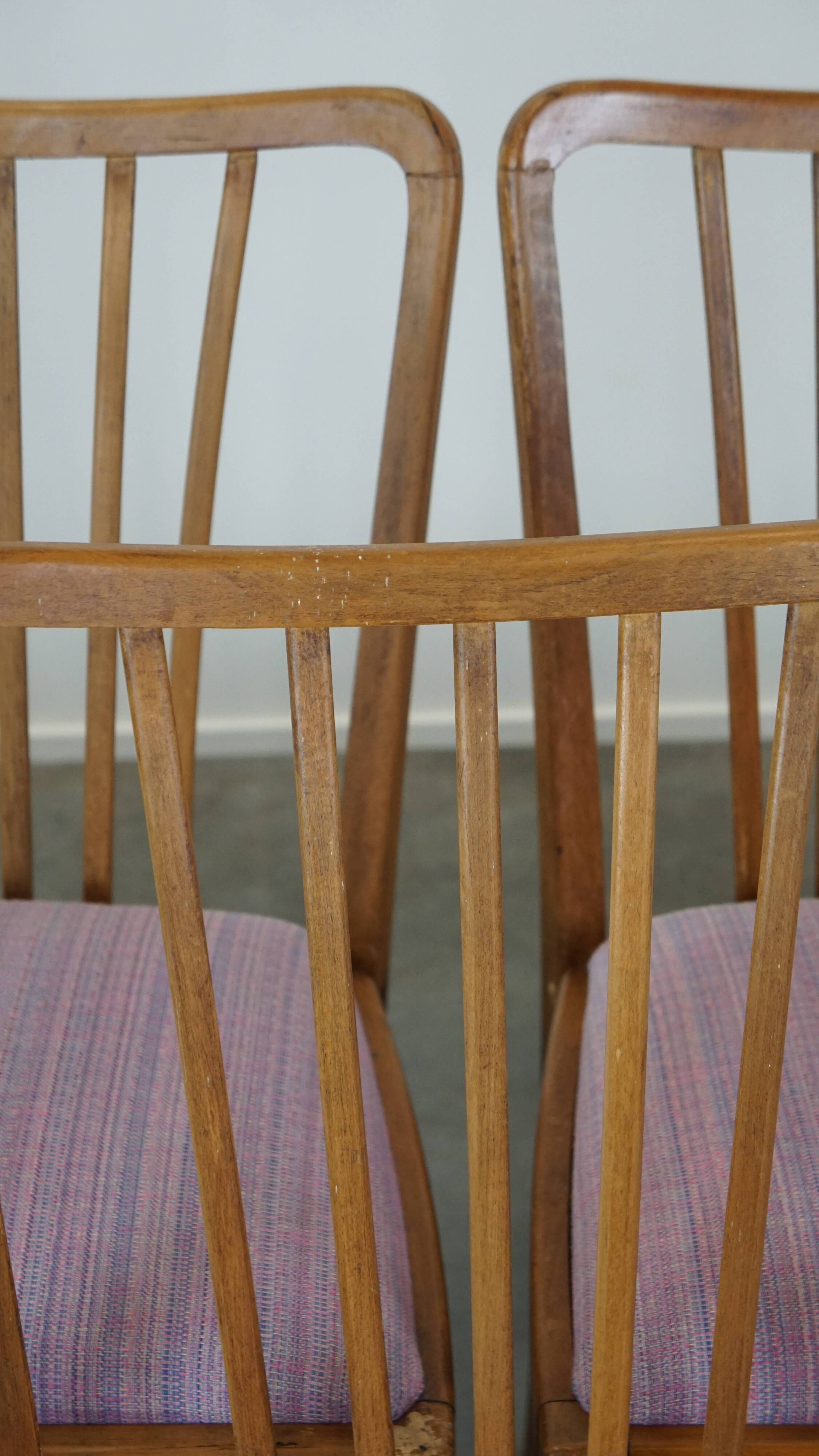 Set of 8 vintage Danish design dining chairs from the 1970s with light purple fabric seats