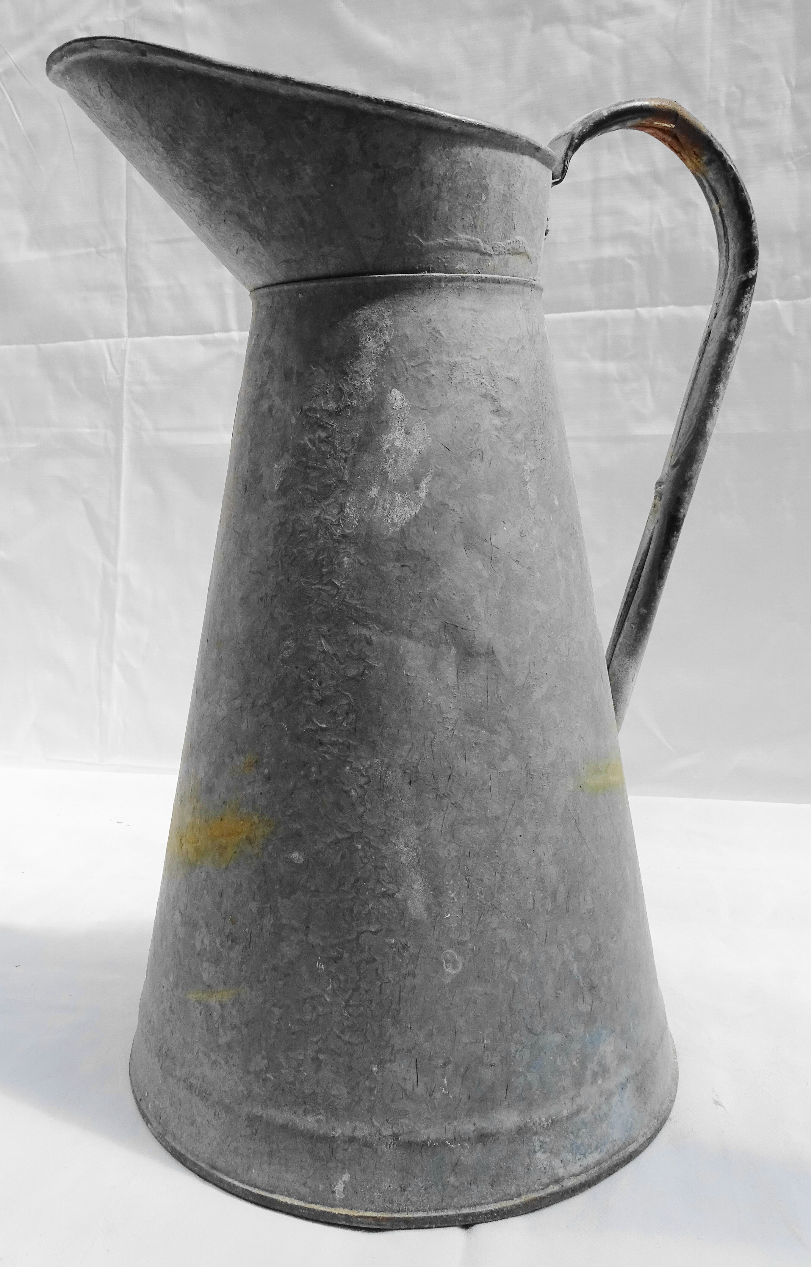 Old zinged metal broc