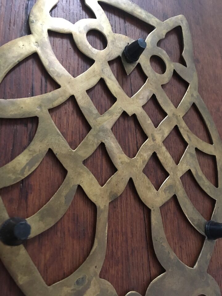 Under the nice brass dish.