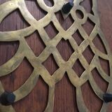 Under the nice brass dish.