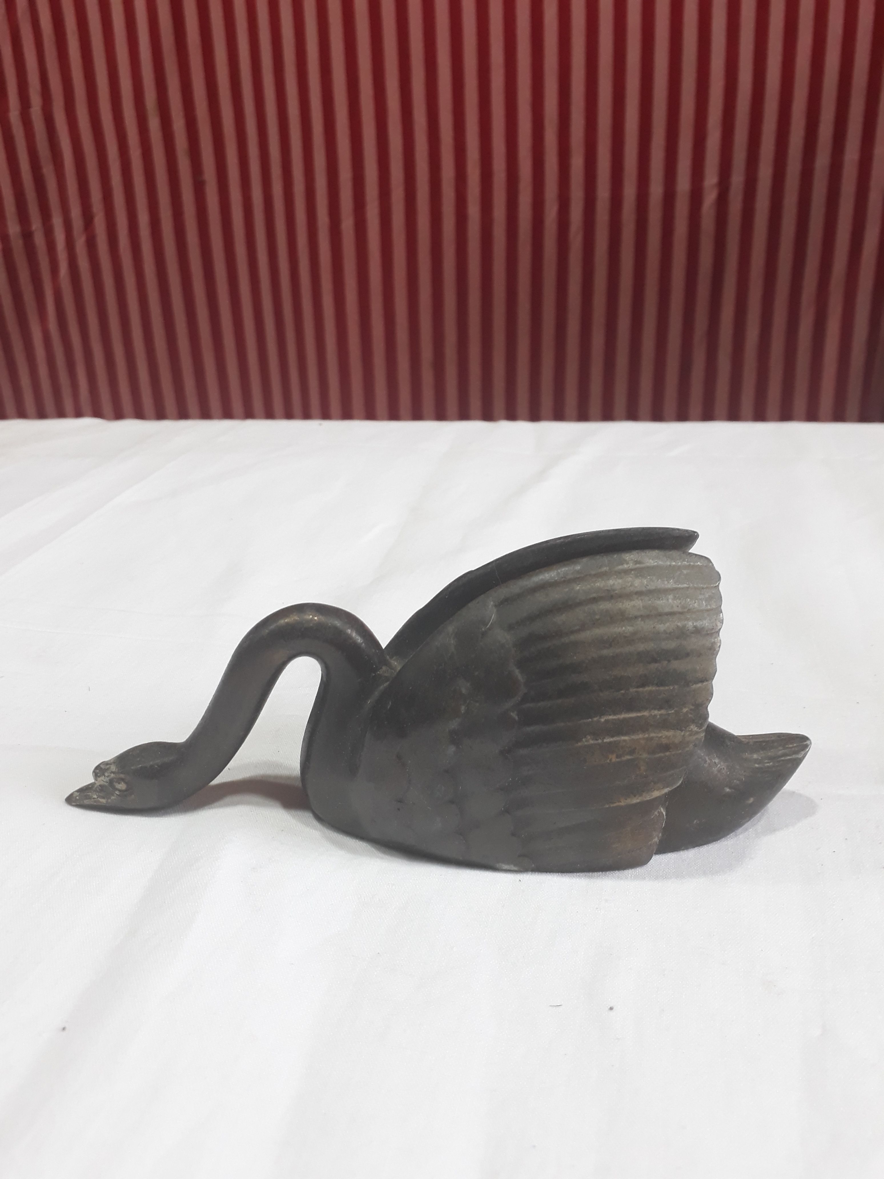 Old mail carrier swan (towel holder or letter holder) made of metal
