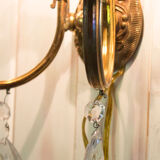 Old brass wall lamp with grapevines