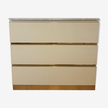 Chest of drawers with travertine