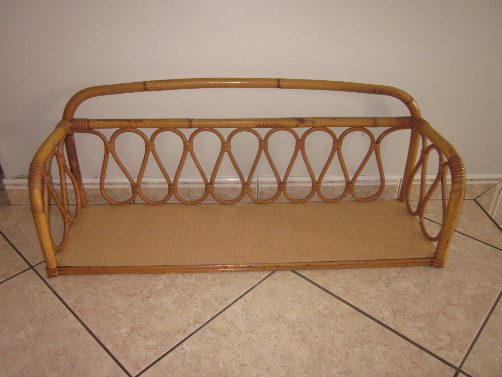 Shelf in rattan of the years 60