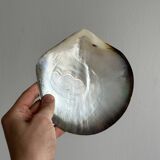 Mother-of-pearl pocket emptier