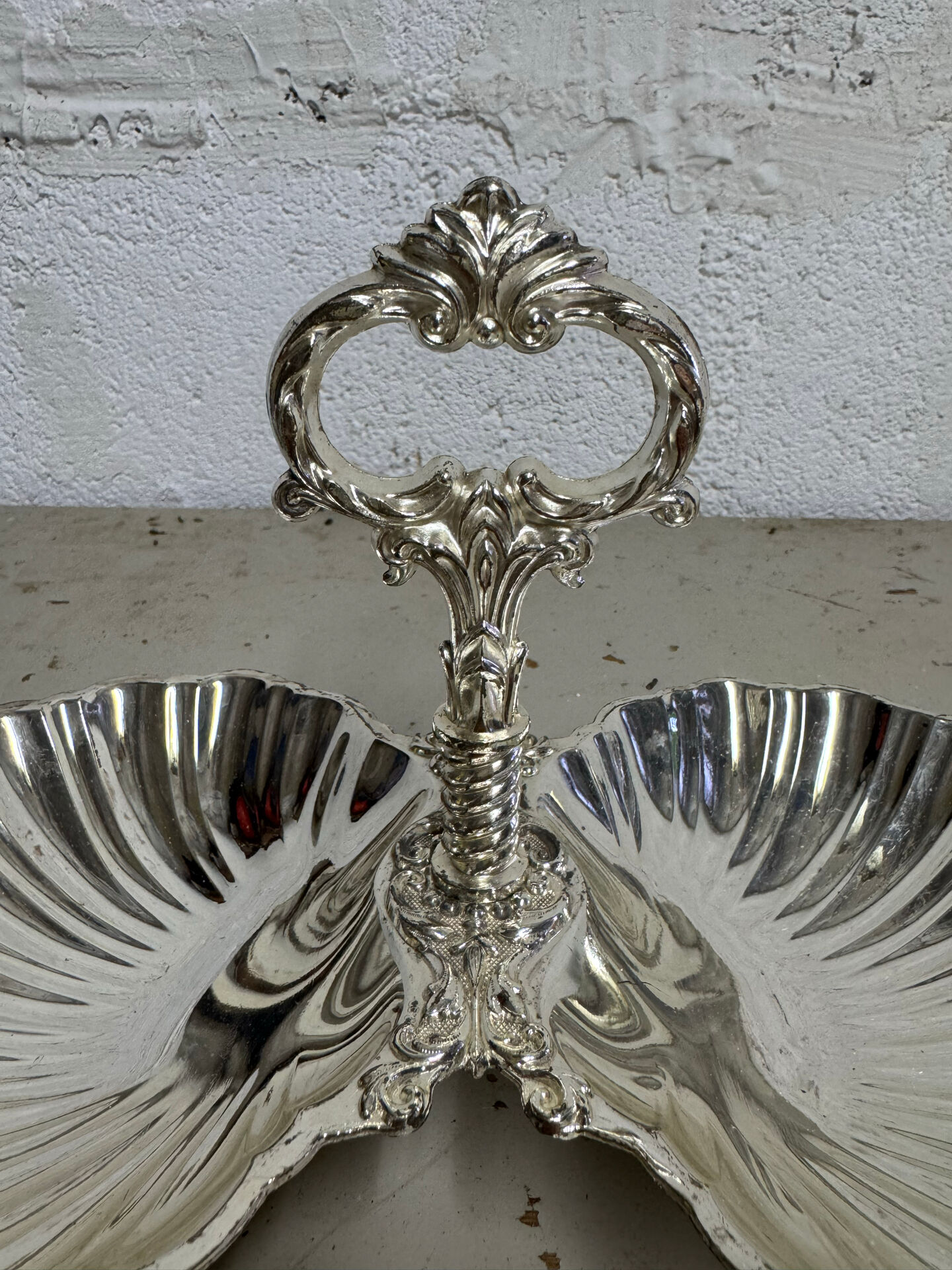 Vintage silver-plated shell display stand