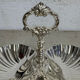 Vintage silver-plated shell display stand
