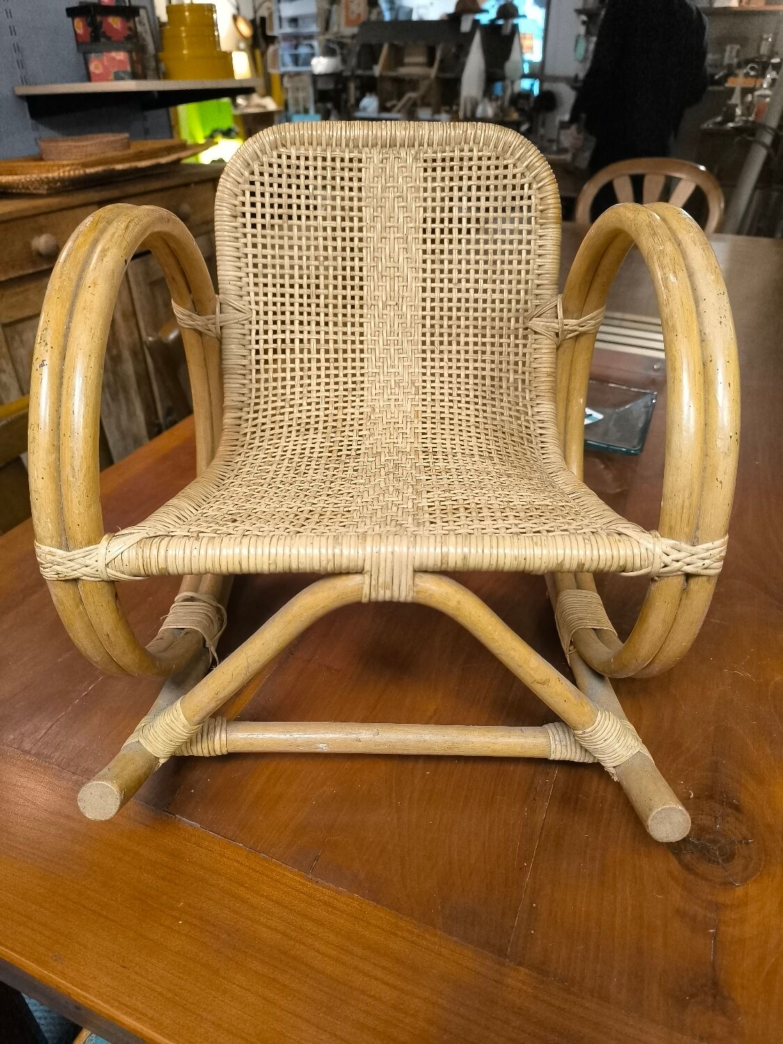Child's rocking chair in rattan