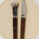 Snack set János Megyik, knife, fork and wooden board, Amboss Austria, 1970s