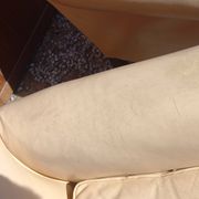 Pair of 1930s club armchairs in ivory leather.
