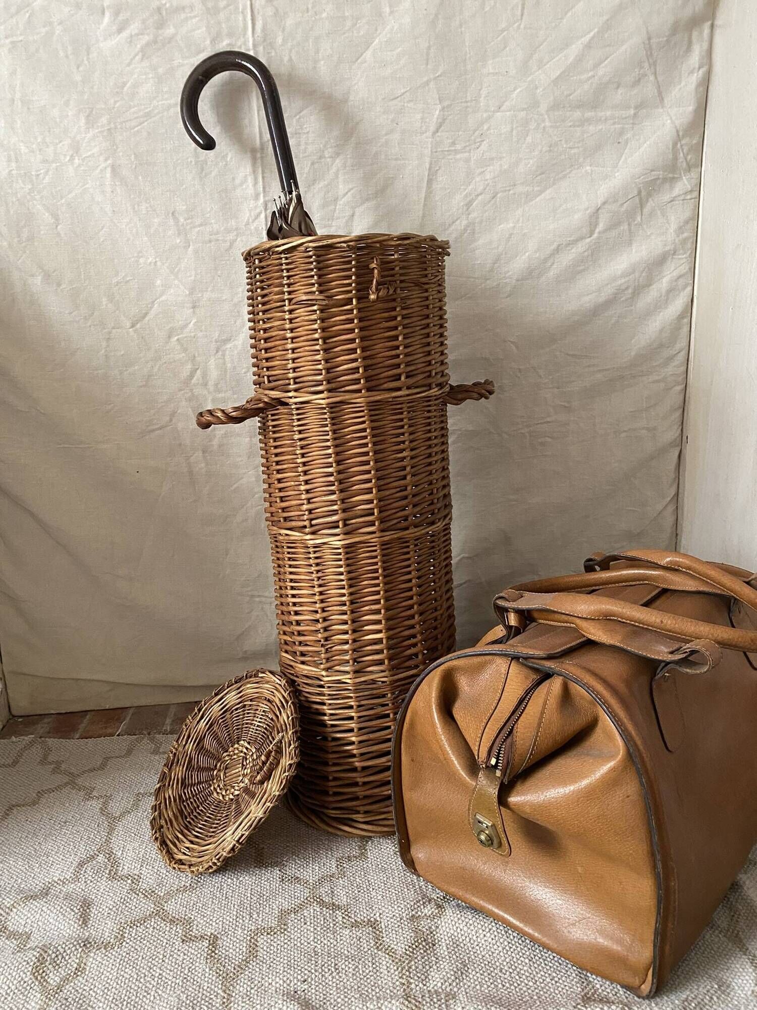 Woven wicker basket, vintage rod holder
