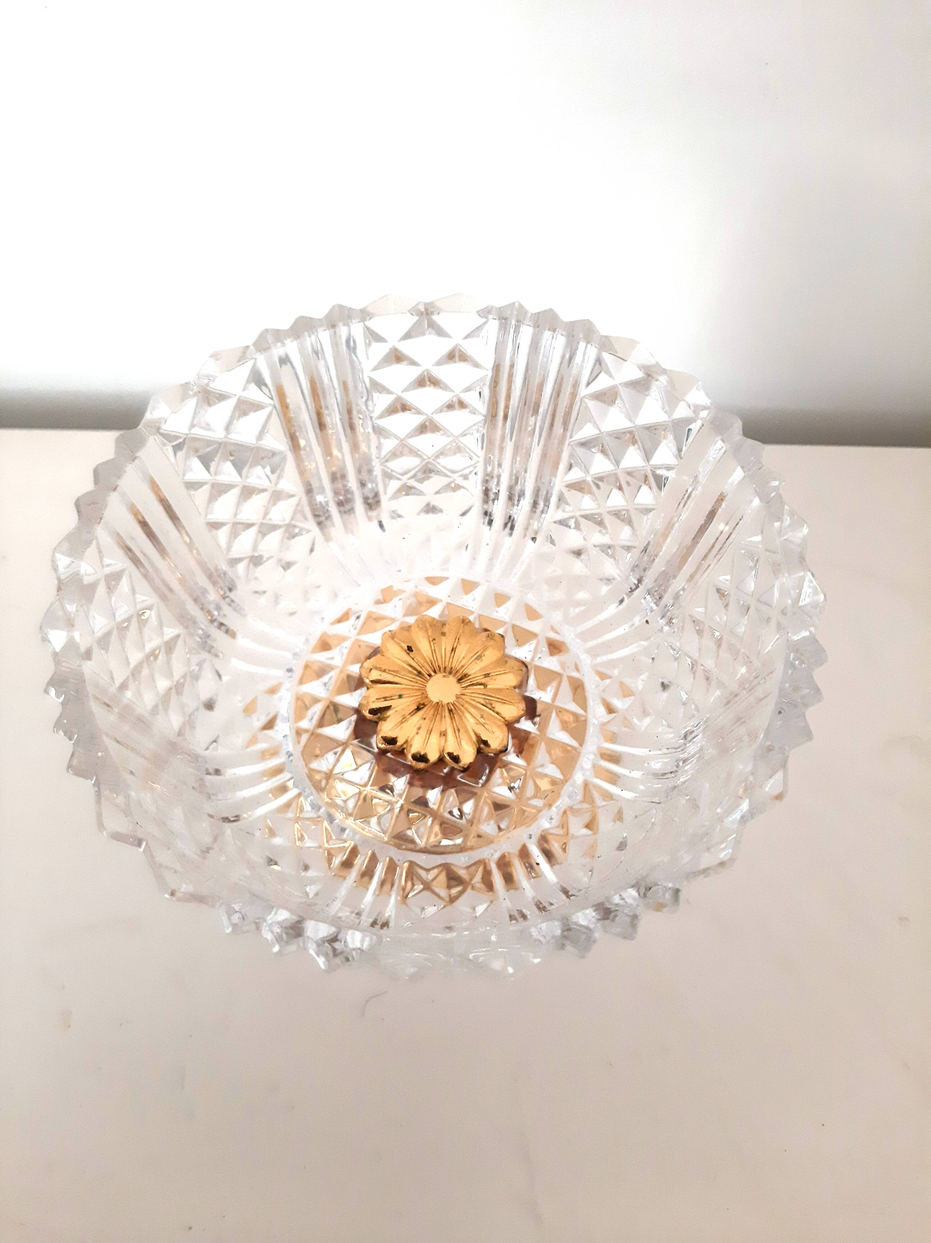 Chiseled crystal bowl with gilded metal base