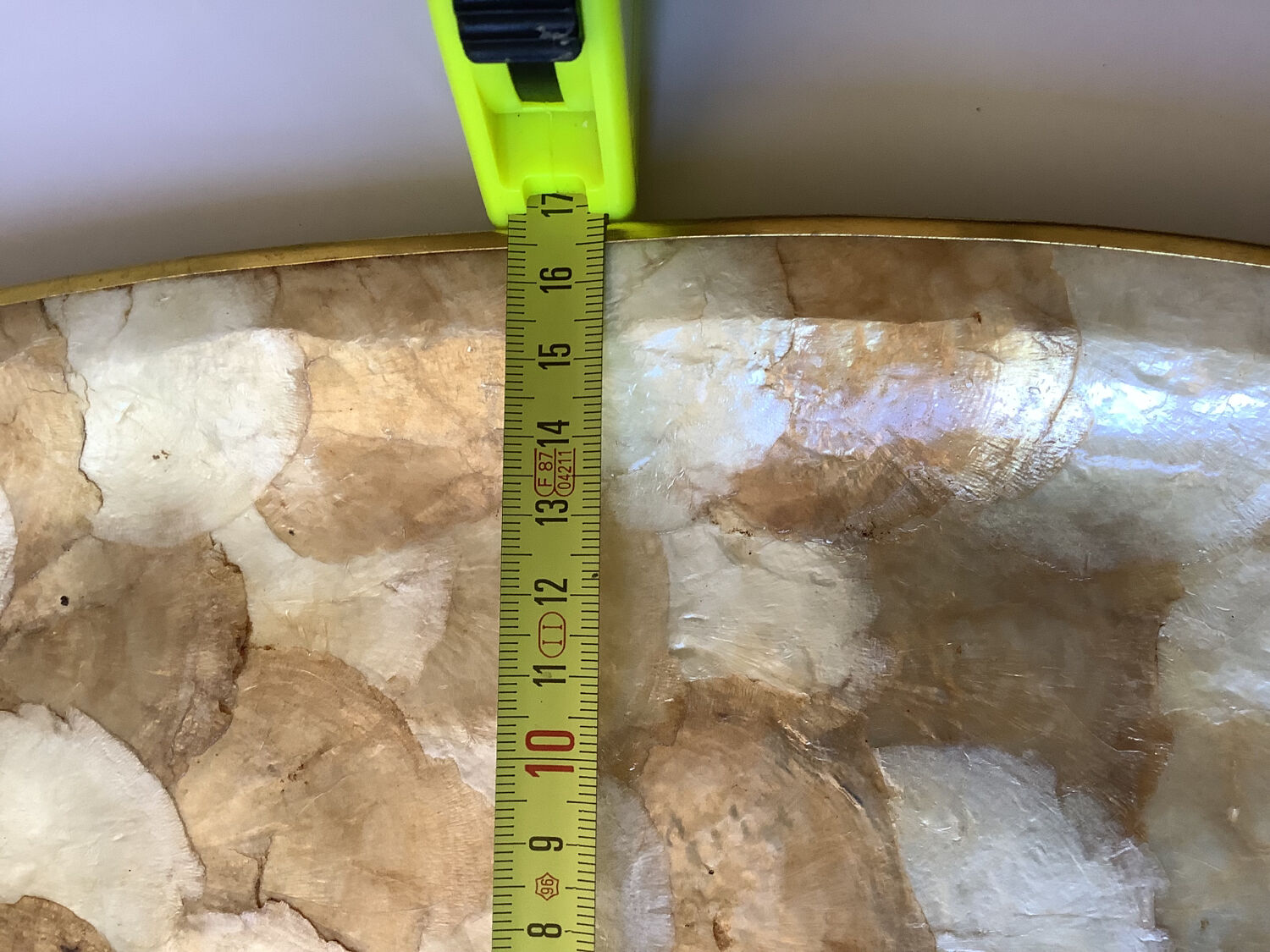 Top in mother-of-pearl and vintage brass