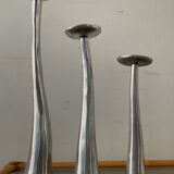 Trio of vintage cast aluminum candlesticks