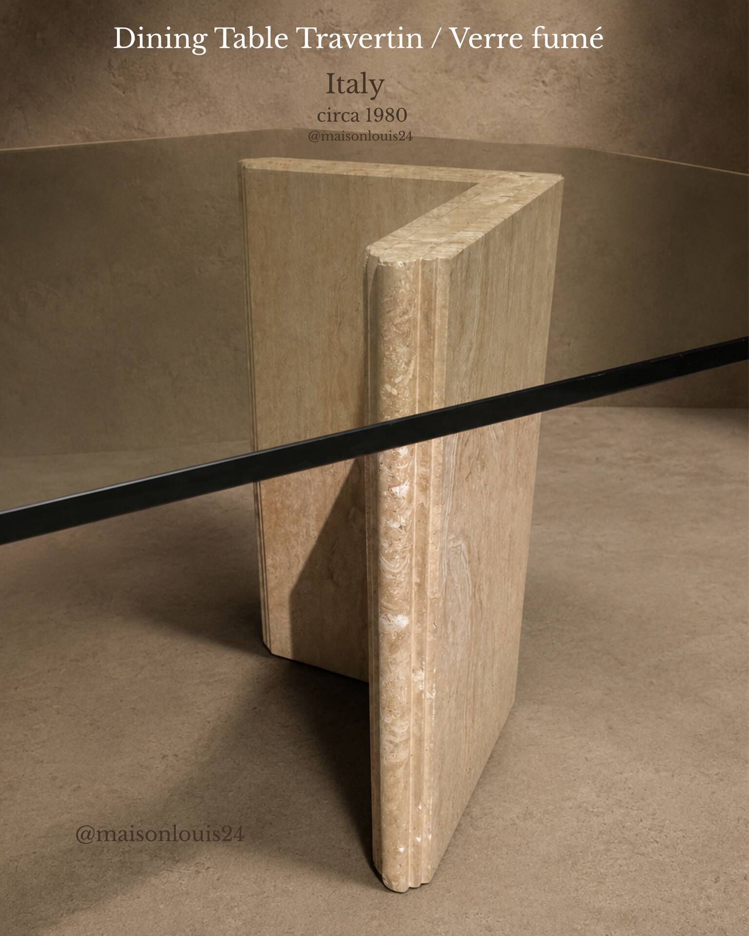 Dining table in travertine and smoked glass.