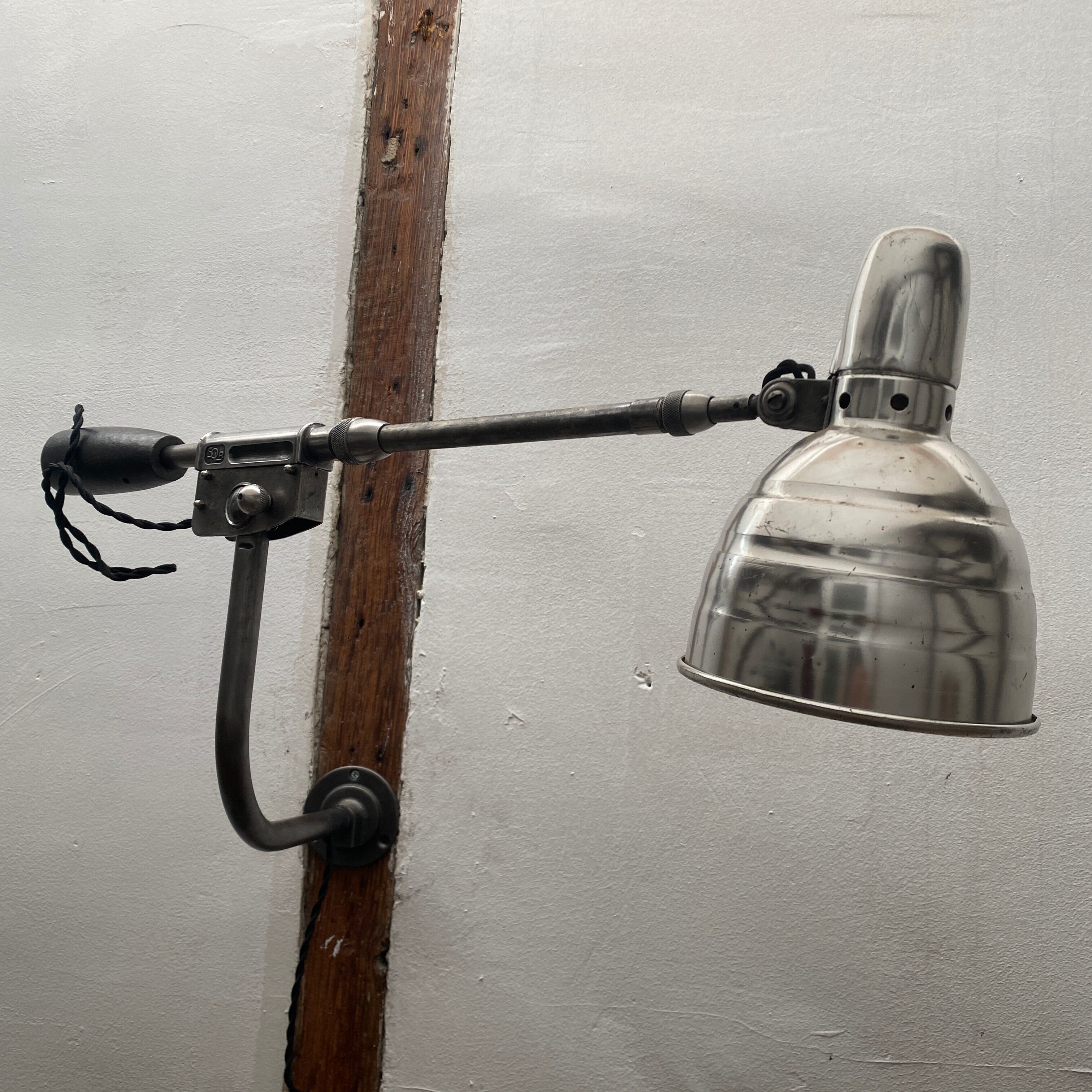 Industrial counterweight wall light from Solère
