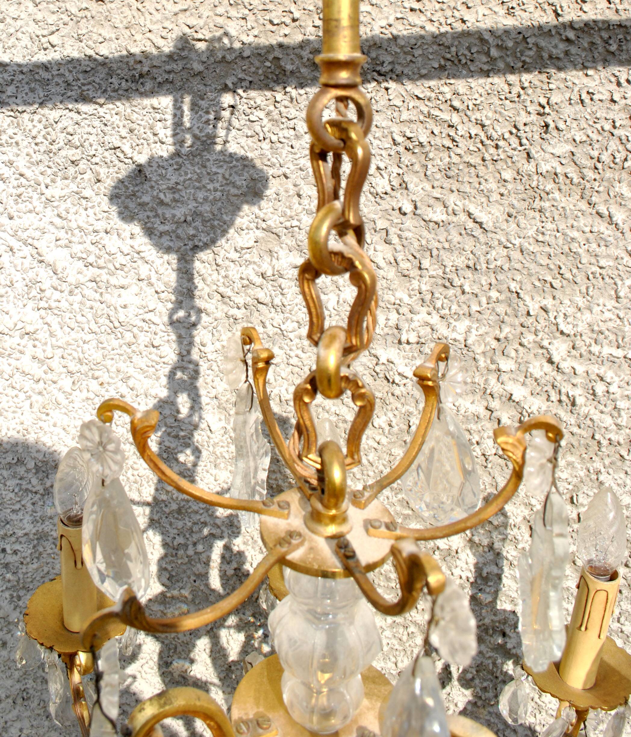 Lustre à pampilles 9 feux monumental en bronze doré et cristal suspension