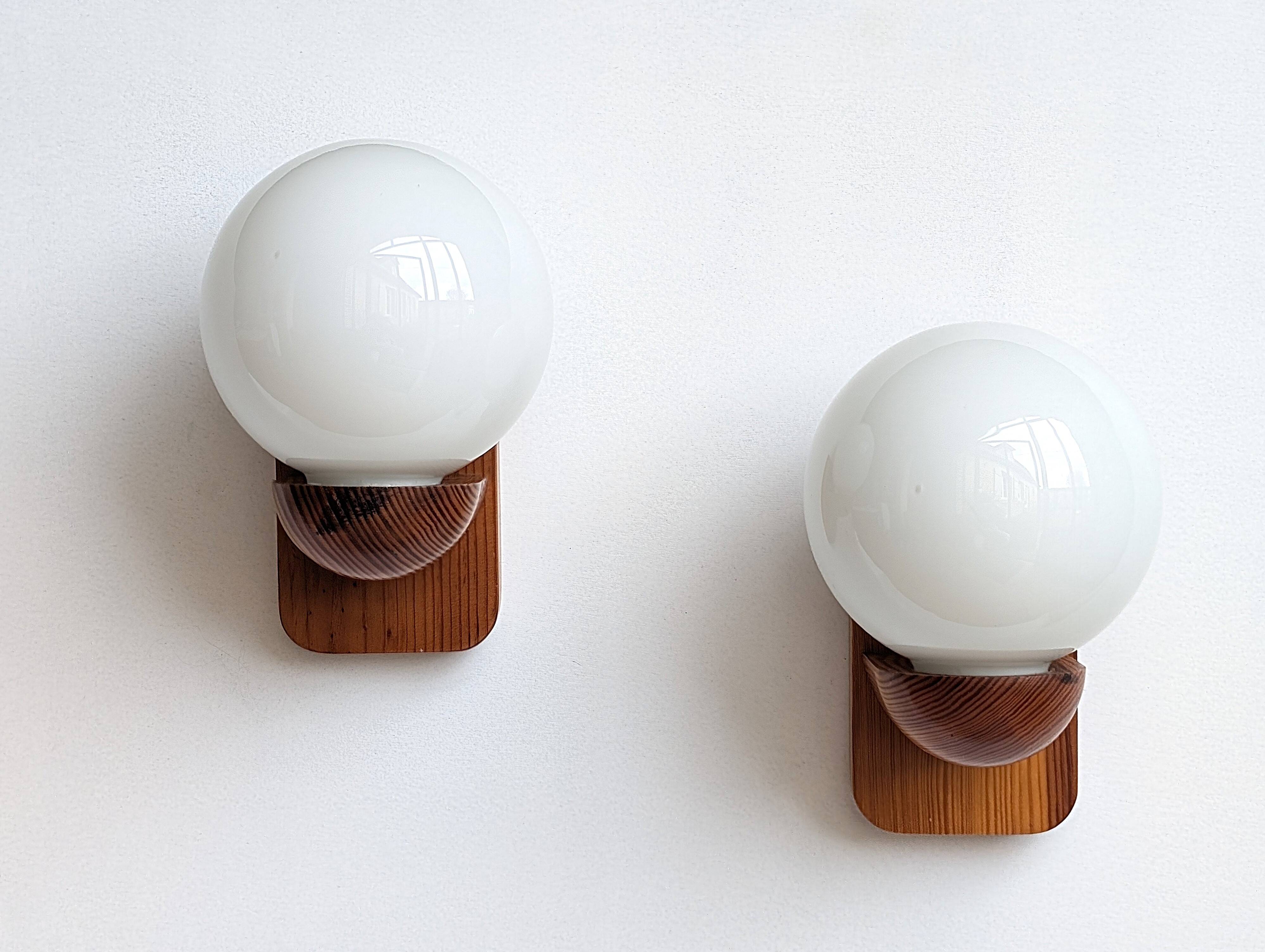 Pair of solid pine and opaline wall lights