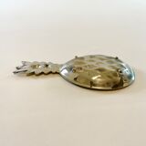 Empty pineapple pocket in silver metal
