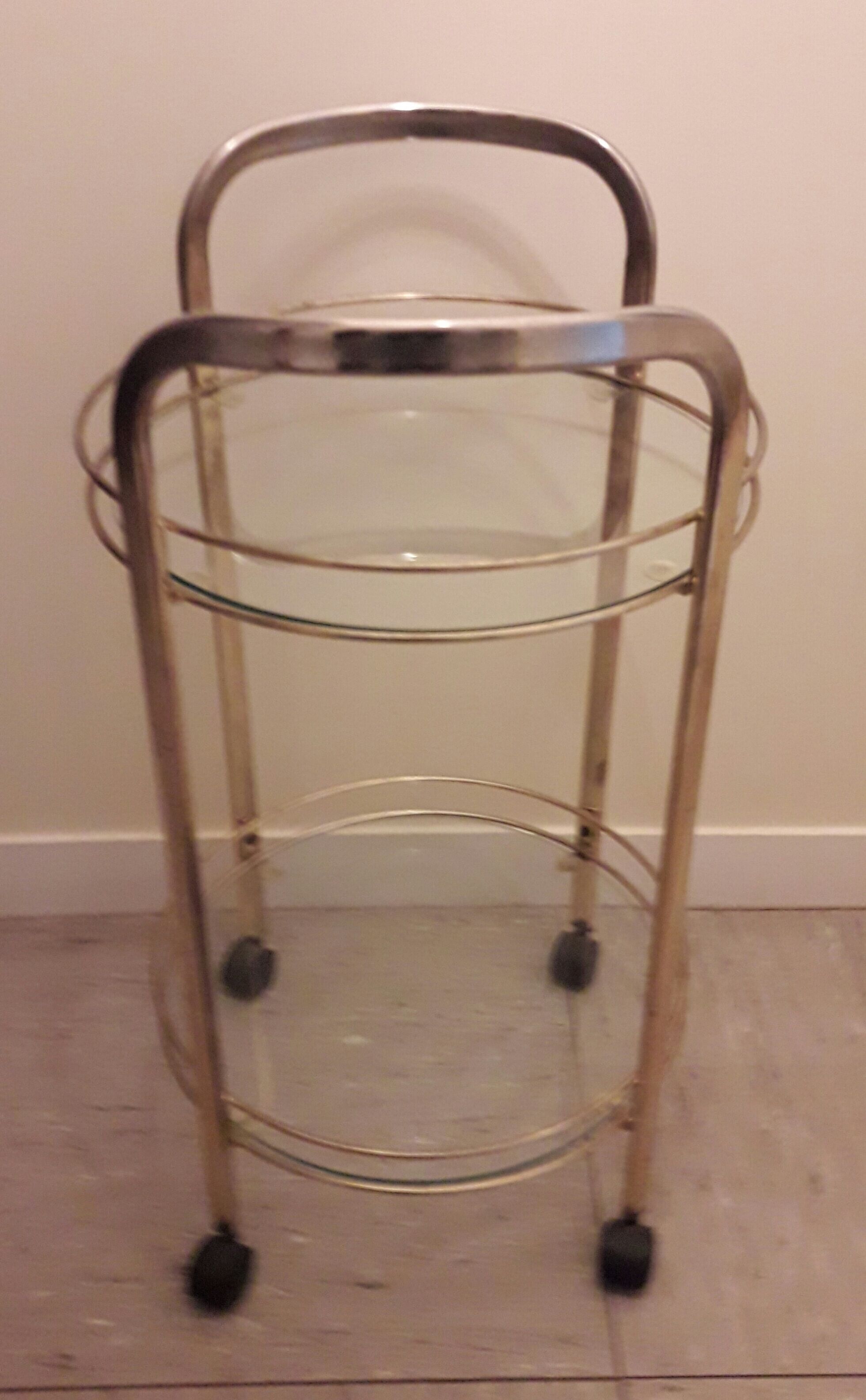 Rolling service in gilded metal and glass