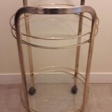 Rolling service in gilded metal and glass