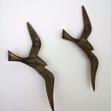 Stylized brass birds