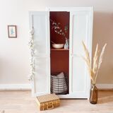 White Parisian wardrobe and terracotta