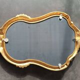 Miroir doré style louis xv.