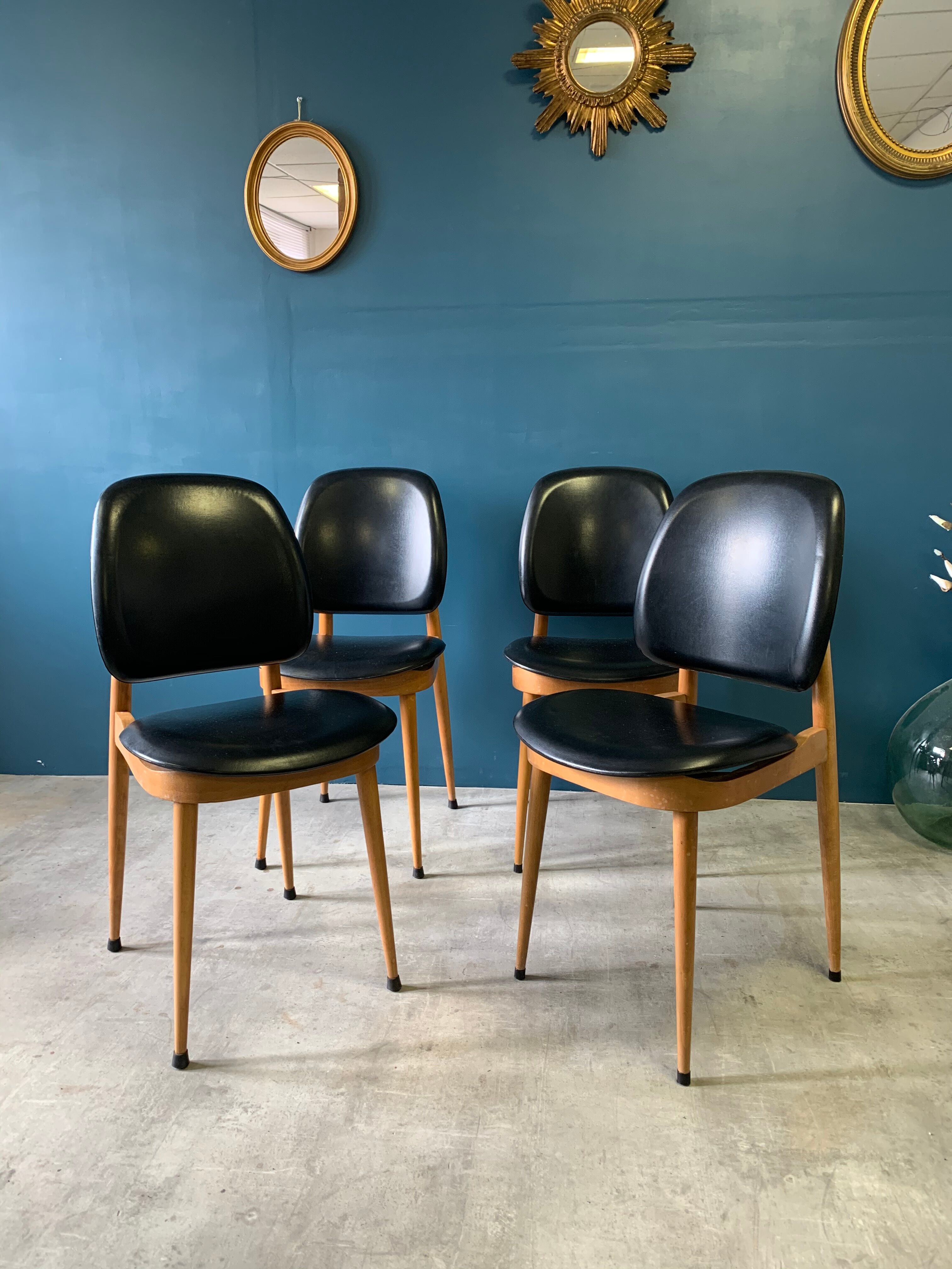Series of 4 pegasus Baumann chairs