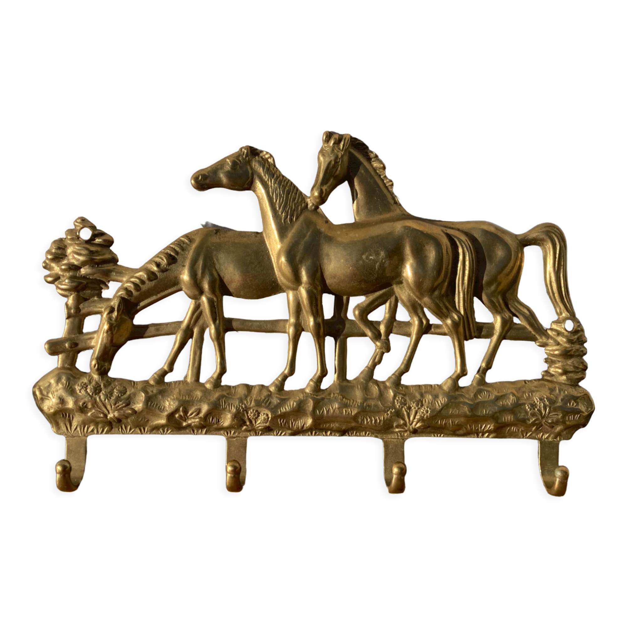 Hook for keys or tea towels in gilded brass with carved horse decoration
