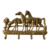 Hook for keys or tea towels in gilded brass with carved horse decoration