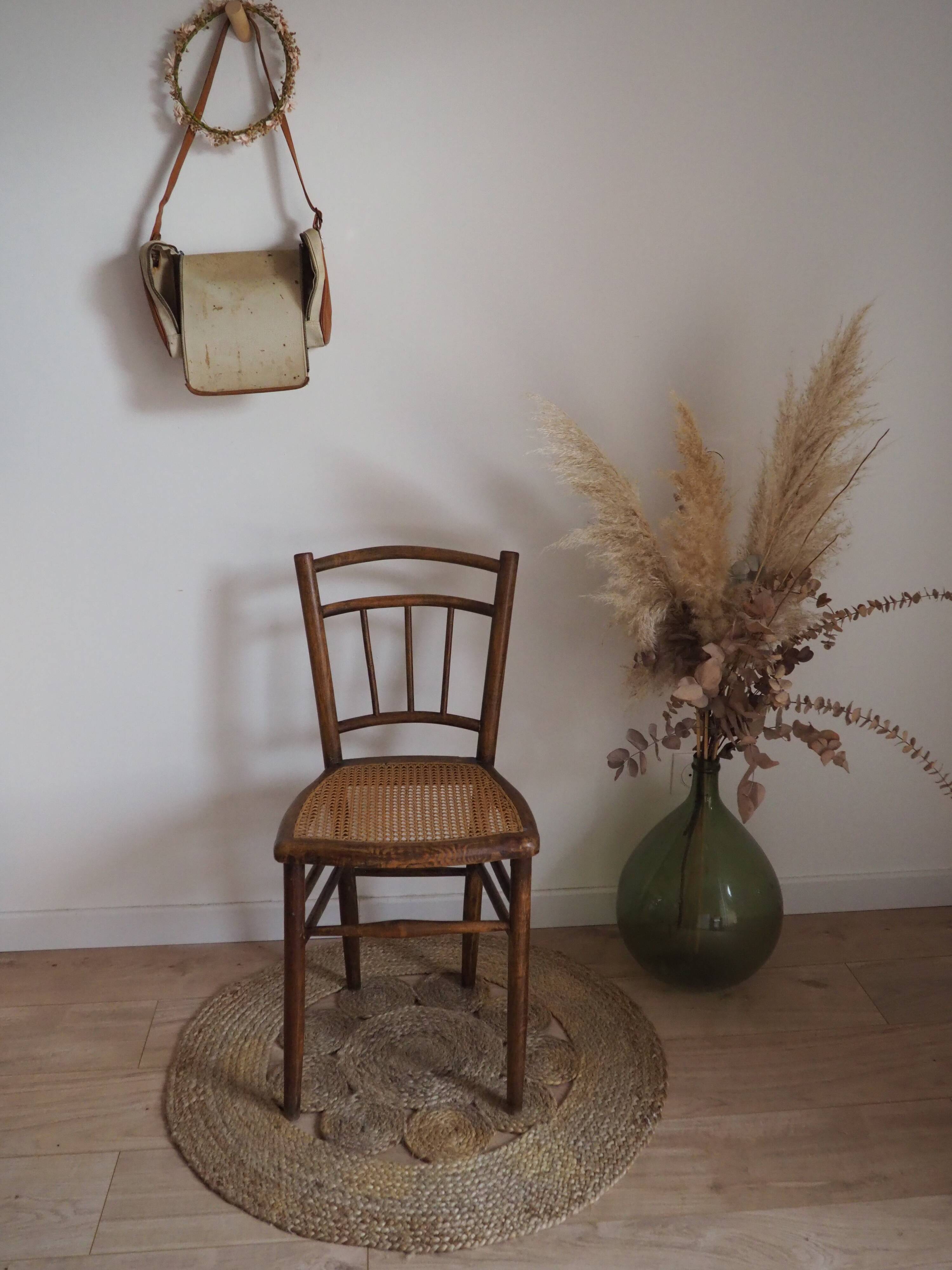 Wooden chair with cane seat