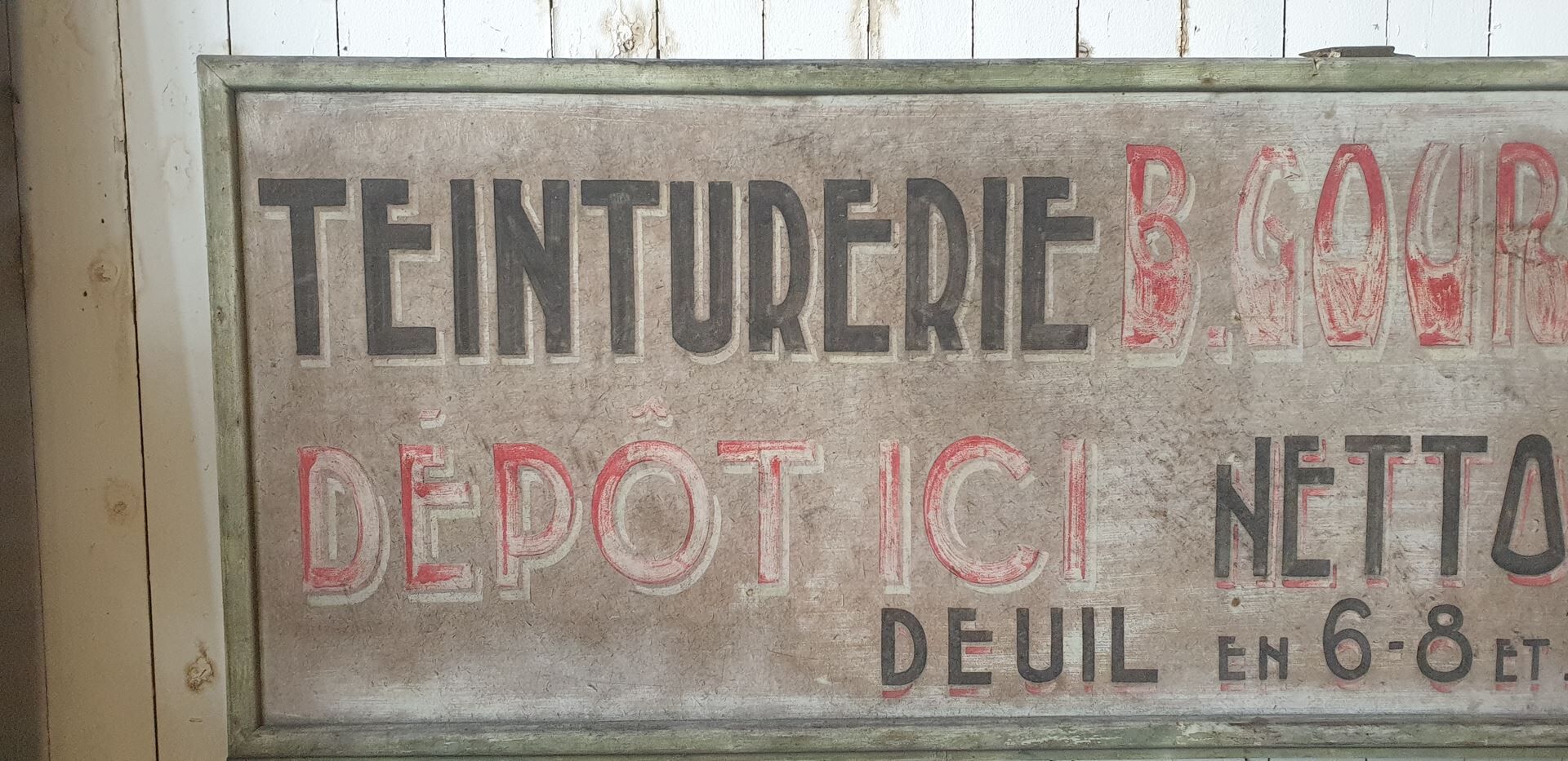 former big wooden advertising sign