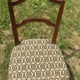Antique chair seat upholsterer medallions