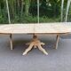Large round extendable dining table renovated in raw pine with 2 extensions, 1980.