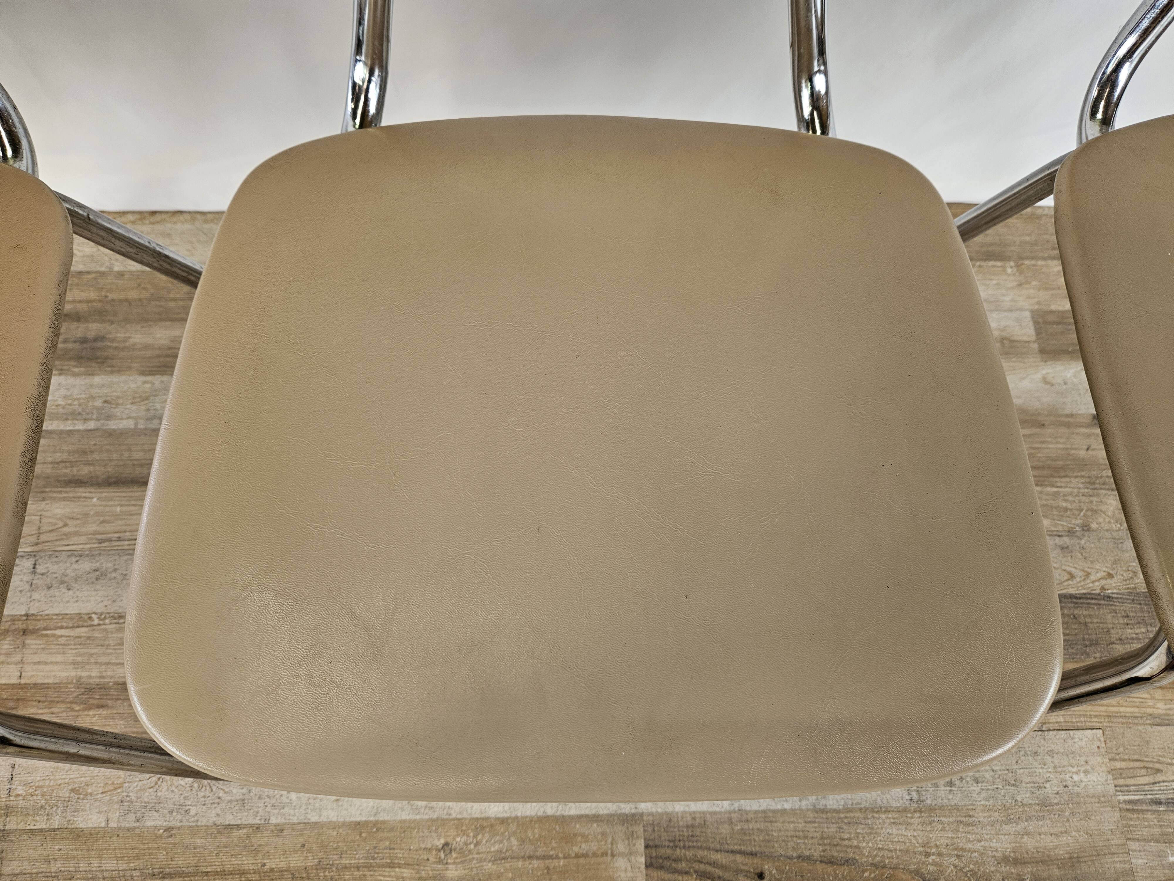 Set of four chairs in iron and skai 1970