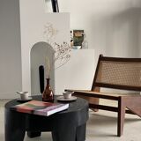 Reclined armchair in canned teak in natural wood