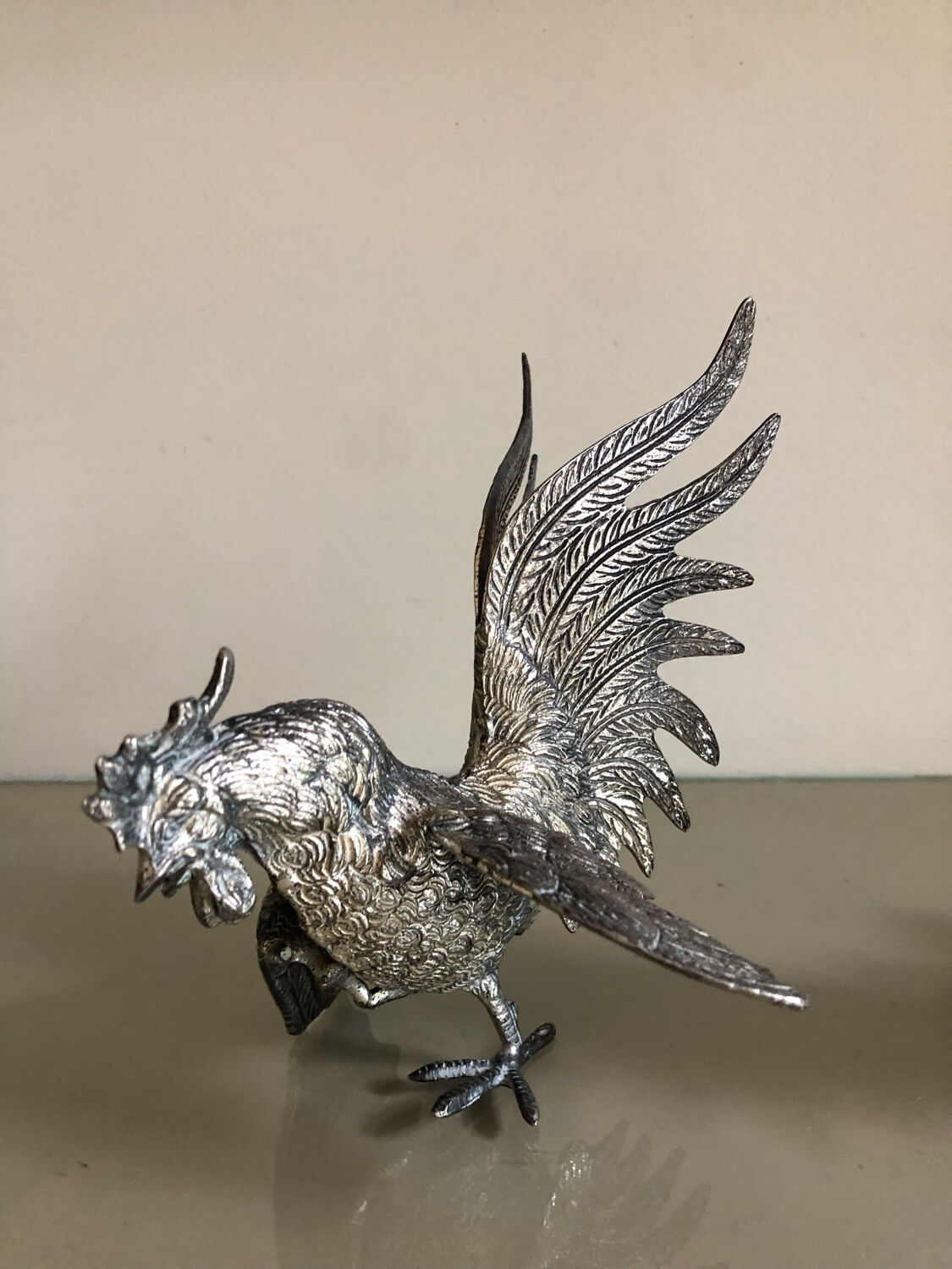 Vintage silver metal roosters