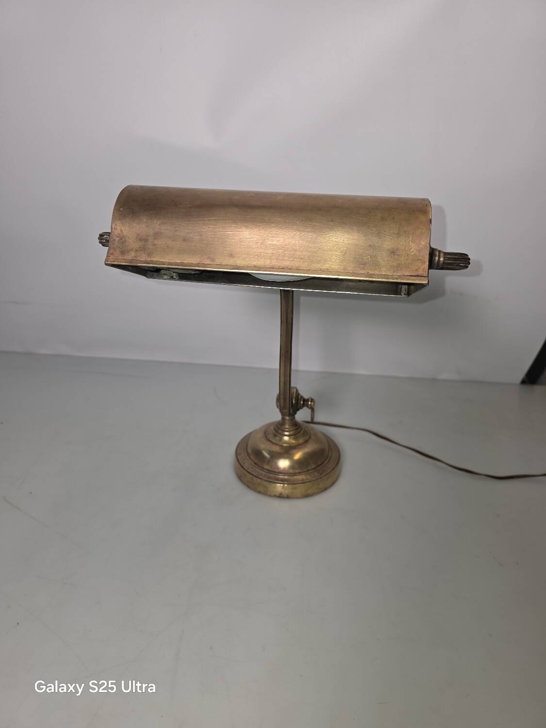 Antique brass desk lamp from a notary.