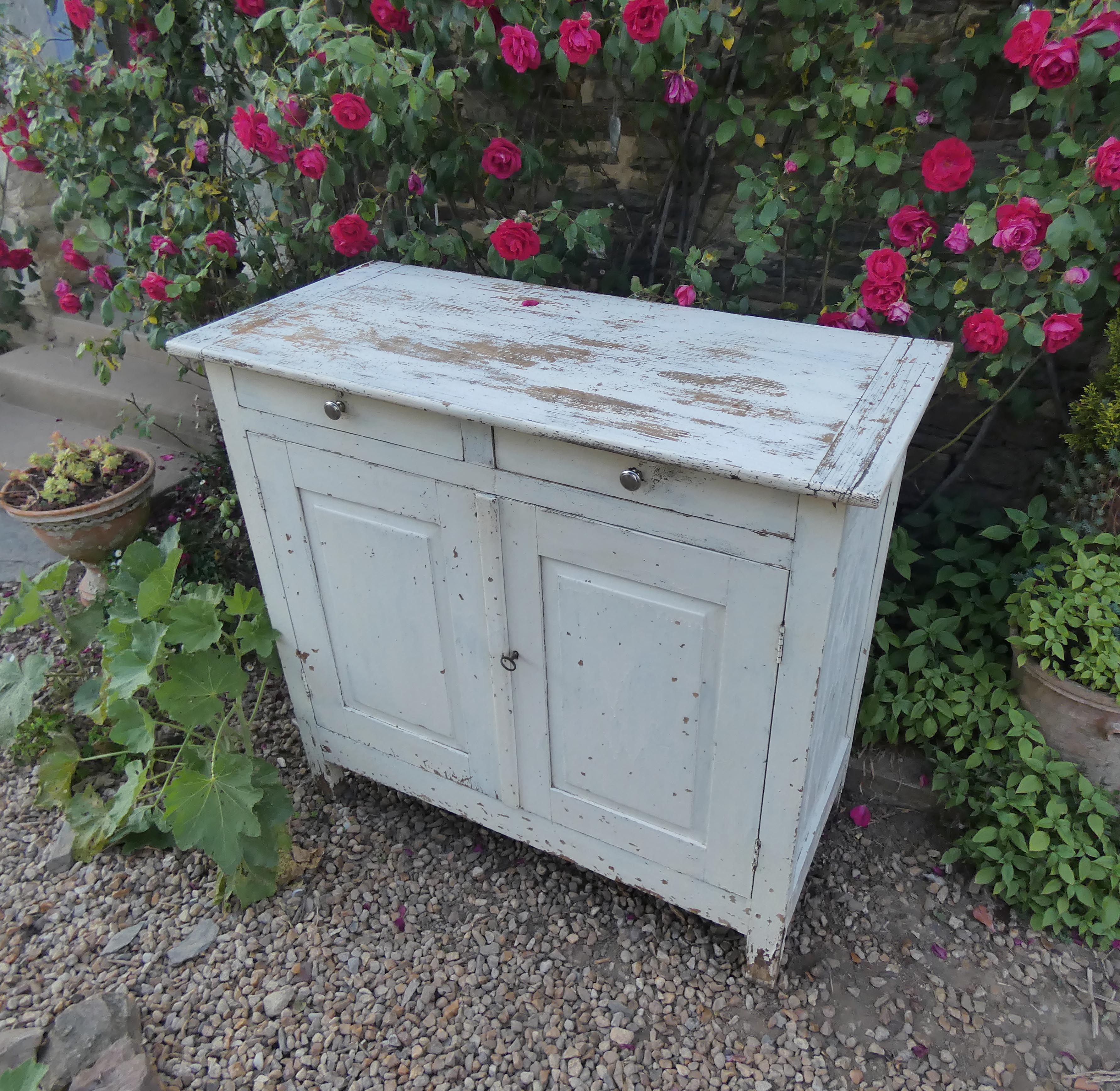 Old patinated wooden sideboard