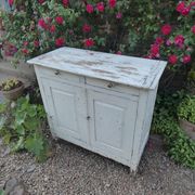 Old patinated wooden sideboard