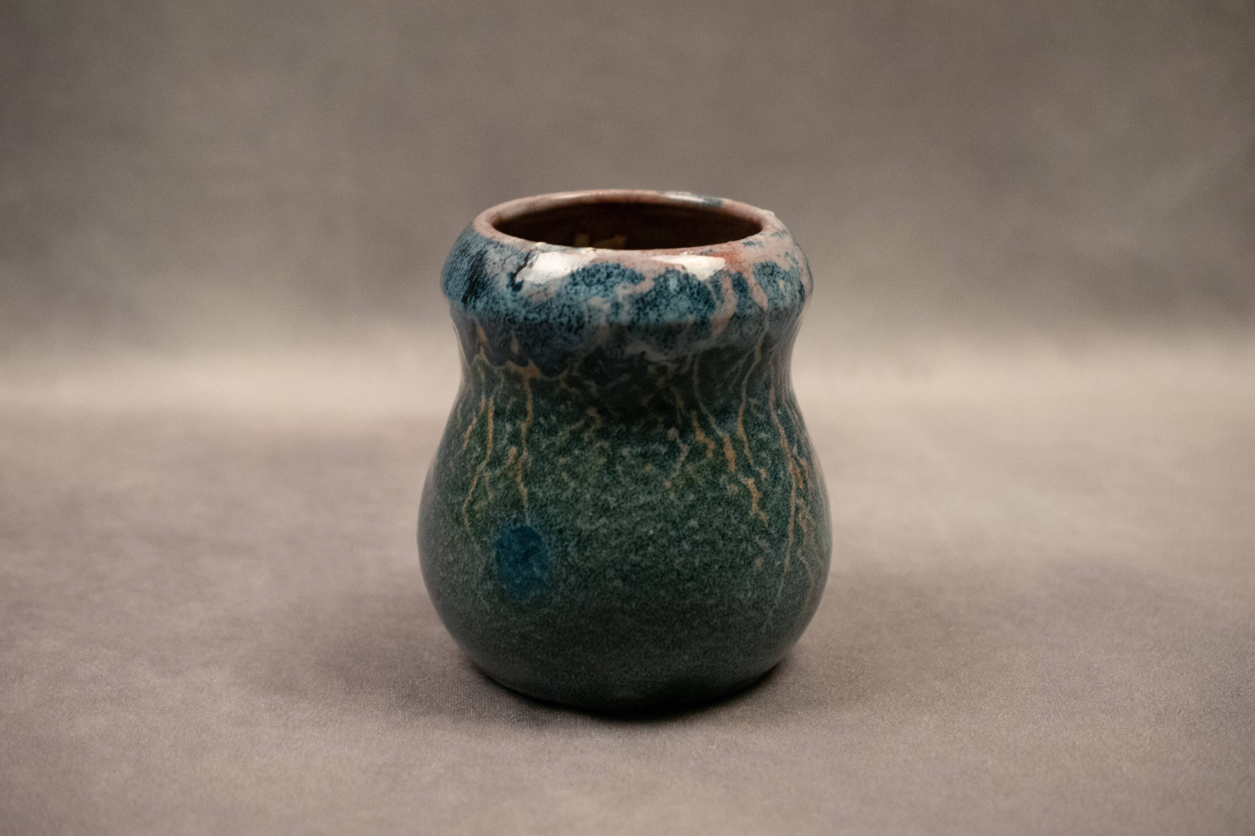 Small flamed stoneware vase in shades of blue and orange