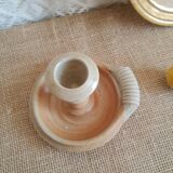 Hand candle holder rat of sandstone cellar