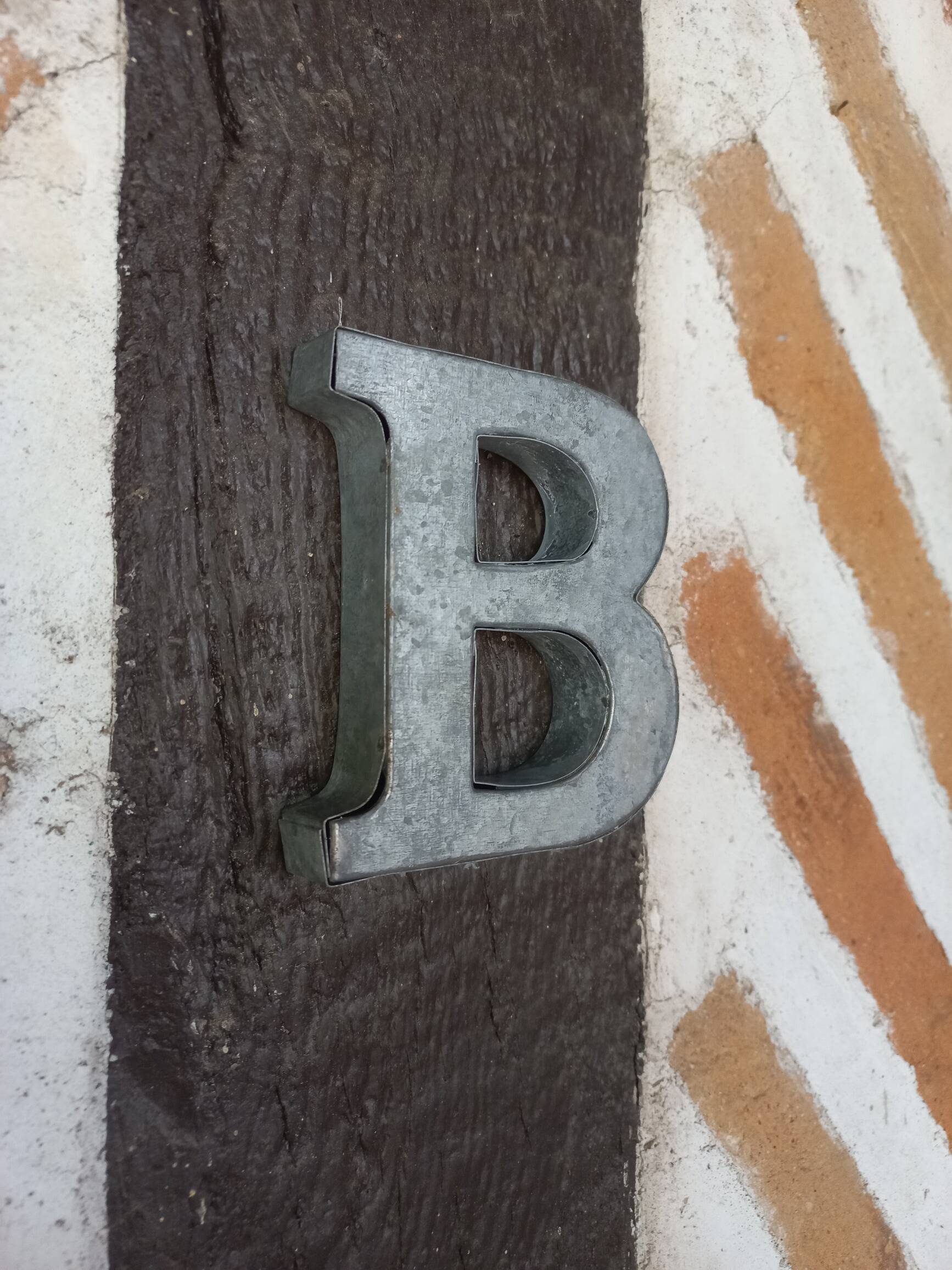 Letter B in zinc