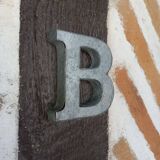 Letter B in zinc