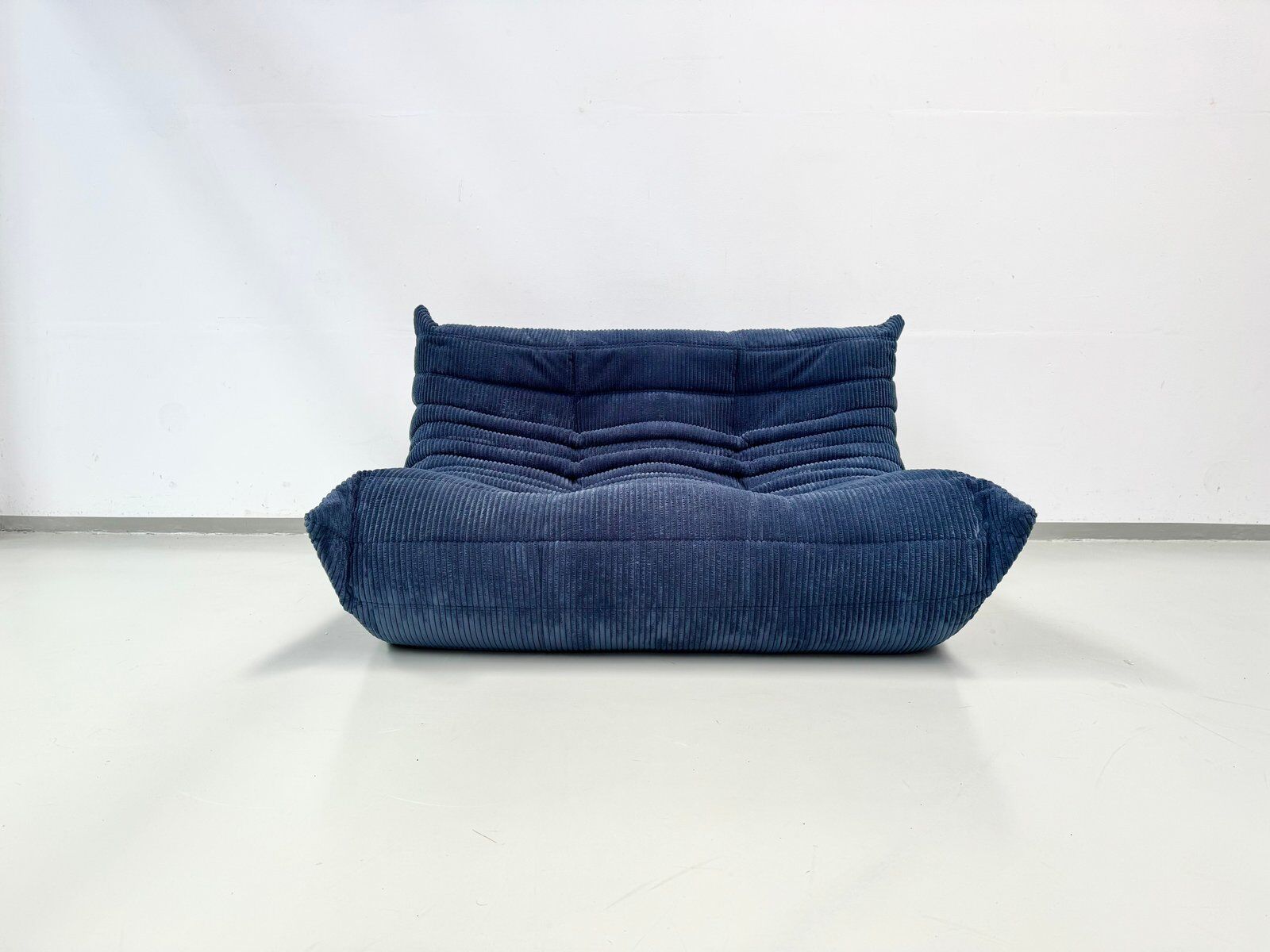 French Togo 2-seater sofa in blue corduroy attributed to Michel Ducaroy for Ligne Roset, 1970s