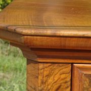 Walnut and walnut burl commode in Louis Philippe style.