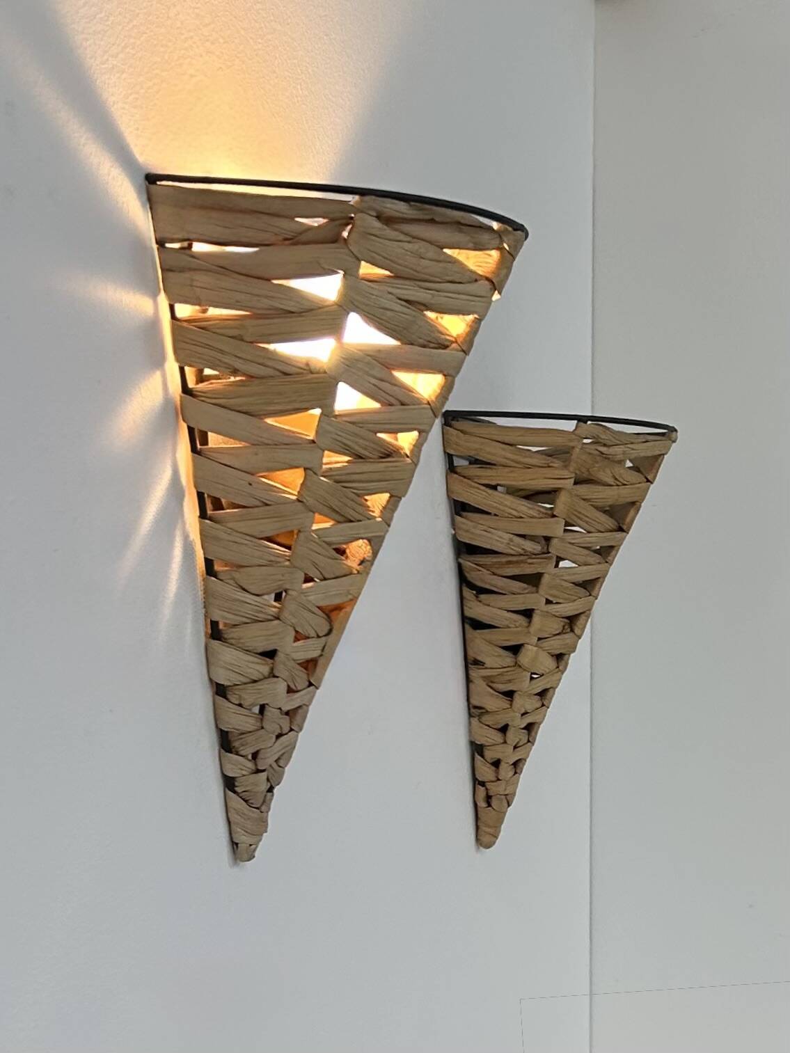 Pair of vintage raffia wall lights, France, 1980.