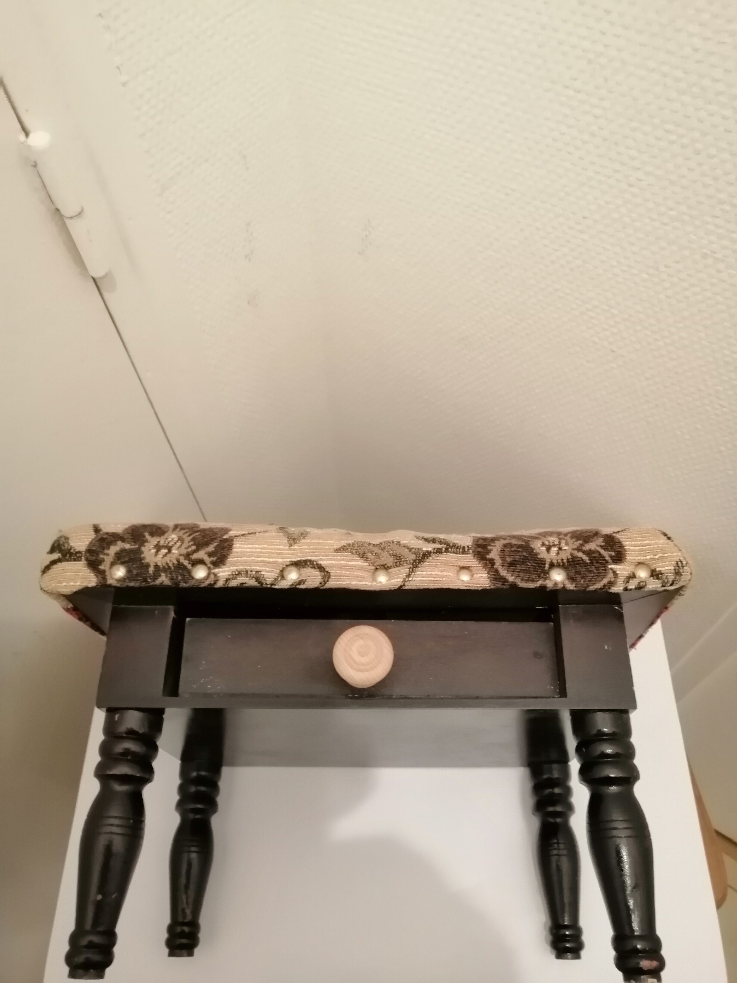 Antique footrest stool in wood and fabric